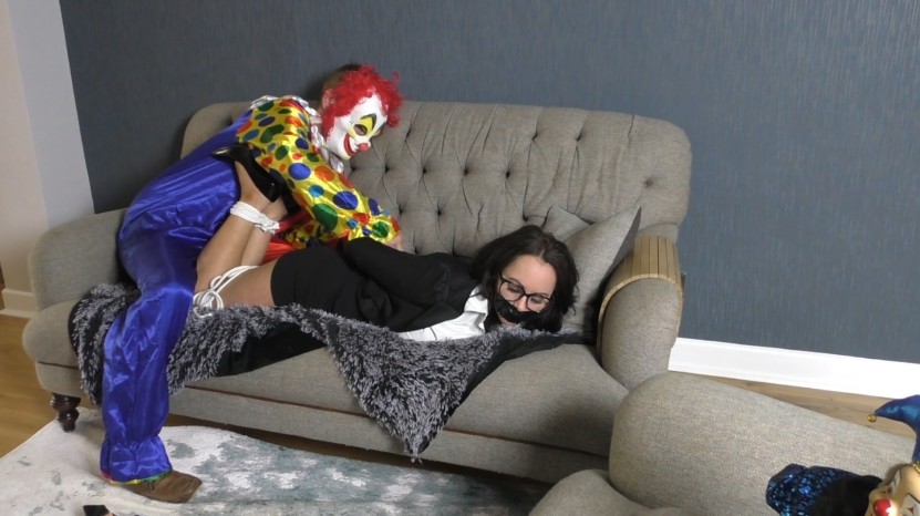 Vickies Captive Struggle – A Clown-Masked Tale
